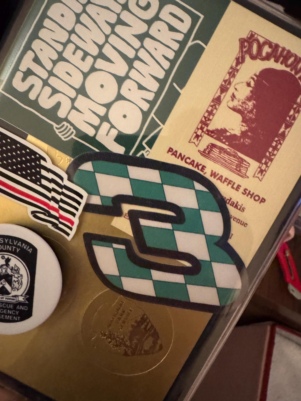 Checkered 3 Sticker 3”